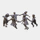 Large Traditional Dancing Children Bronze Sculpture by Giant Sculptures, 150cm, showing seven children in a ring holding hands with a warm mid-brown patina.