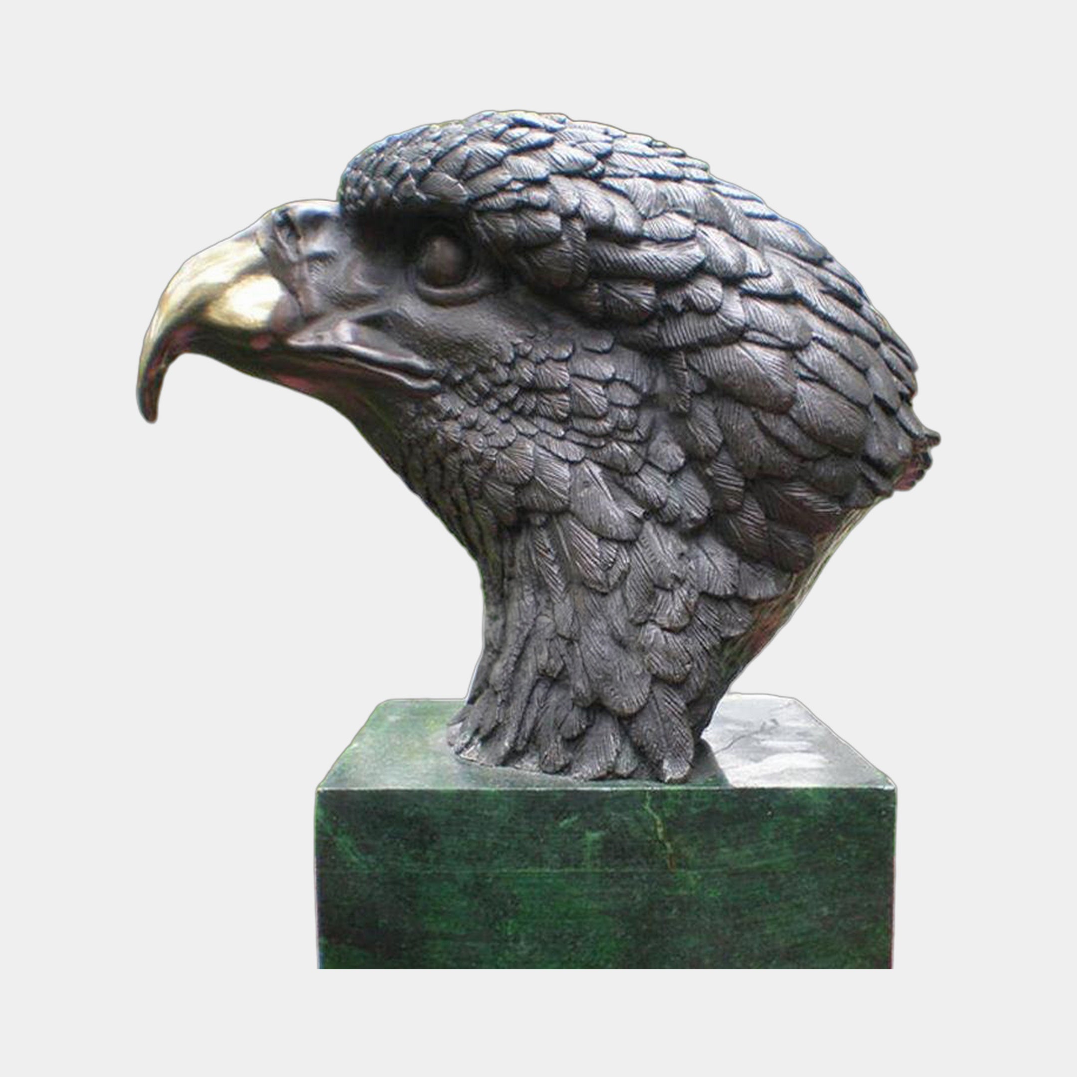 Large Traditional Eagle Head Bronze Bust by Giant Sculptures in profile, dark patina with gold-toned beak, mounted on a green veined marble plinth.