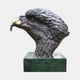 Large Traditional Eagle Head Bronze Bust by Giant Sculptures in profile, dark patina with gold-toned beak, mounted on a green veined marble plinth.