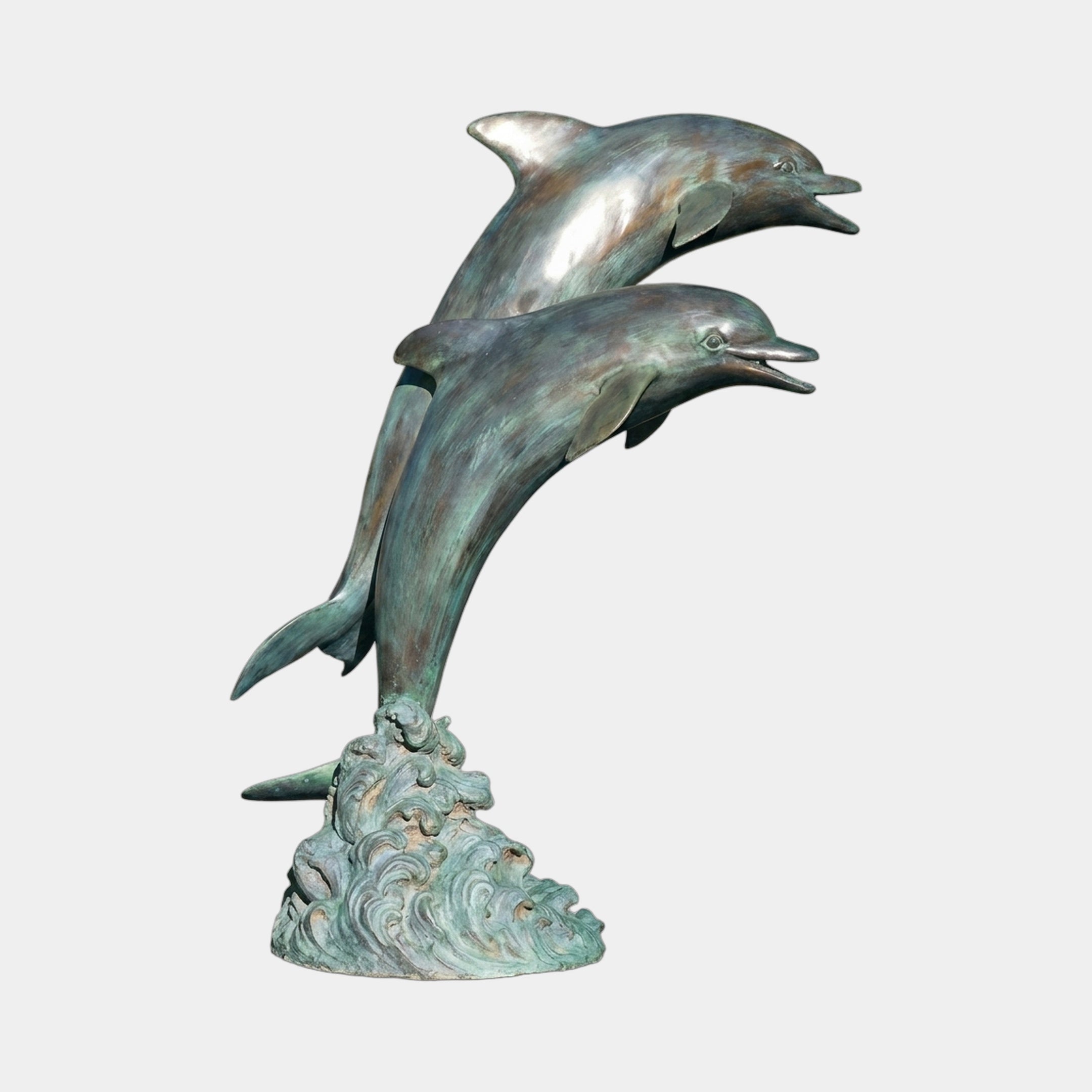 Giant Sculptures Large Traditional Leaping Dolphins Bronze Fountain with verdigris patina, two dolphins arcing from a sculpted wave base on plain background.