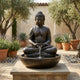 Large Traditional Meditating Buddha Bronze Fountain by Giant Sculptures in dark patina, seated in lotus pose with water cascading into a basin in a sunlit courtyard.