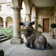 Large Traditional Seated Pig Bronze Sculpture by Giant Sculptures with warm brown patina on a dark oval base, displayed in a stone cloister courtyard.