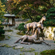 Large Traditional Three Horses Bronze Sculpture by Giant Sculptures in warm amber patina, set on gravel in a Japanese garden beside a stone lantern and maples.