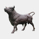 Life-Size Charging Bull Bronze Sculpture by Giant Sculptures, 210cm, shown in side profile with head raised, dark brown patina, on a plain light background.