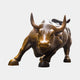 Life-Size Charging Bull Bronze Statue 220cm by Giant Sculptures, shown front-on in a lowered charging pose with warm brown patina and golden highlights on a plain background.