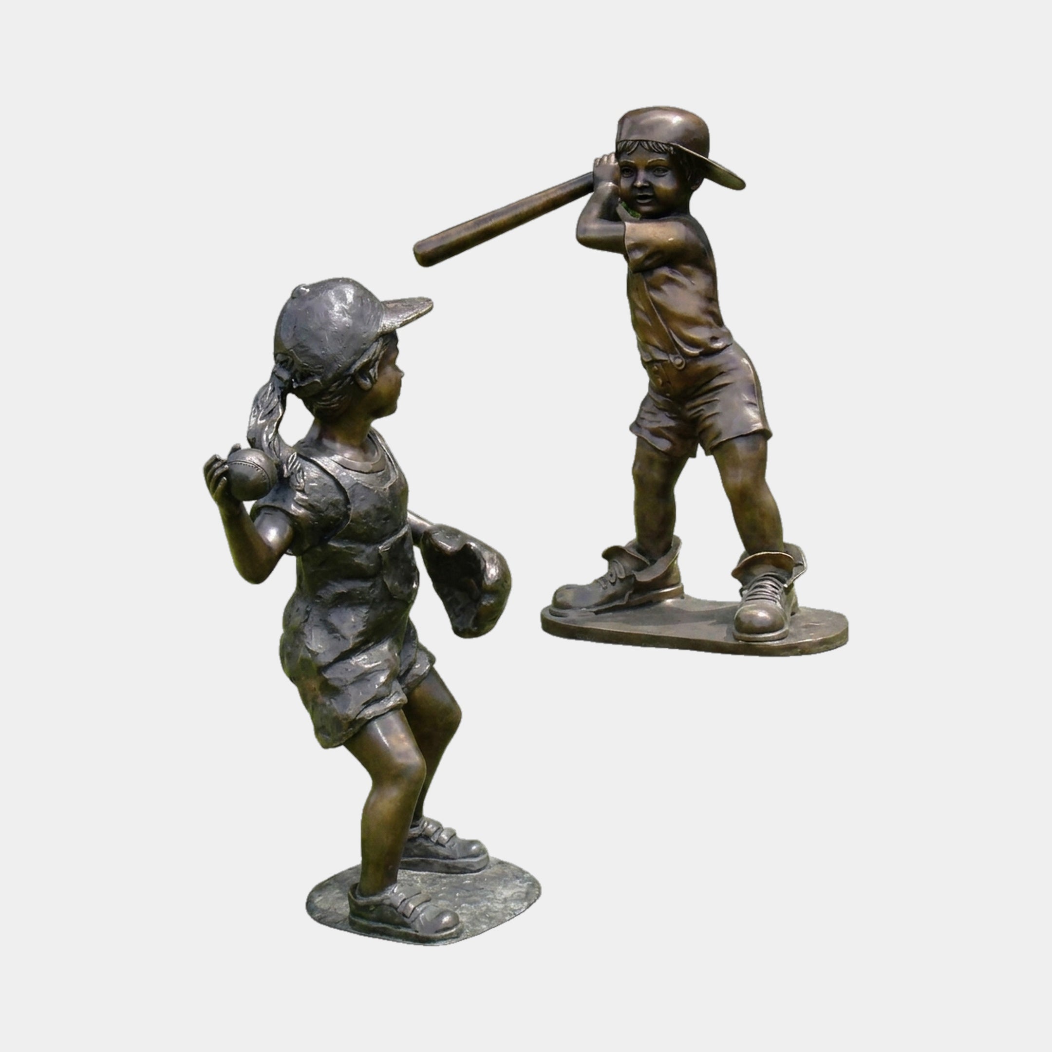 Giant Sculptures Life-Size Children Baseball Players Bronze Sculpture Set 120cm, with a girl pitcher holding a ball and a boy batter mid-swing, on a plain background.