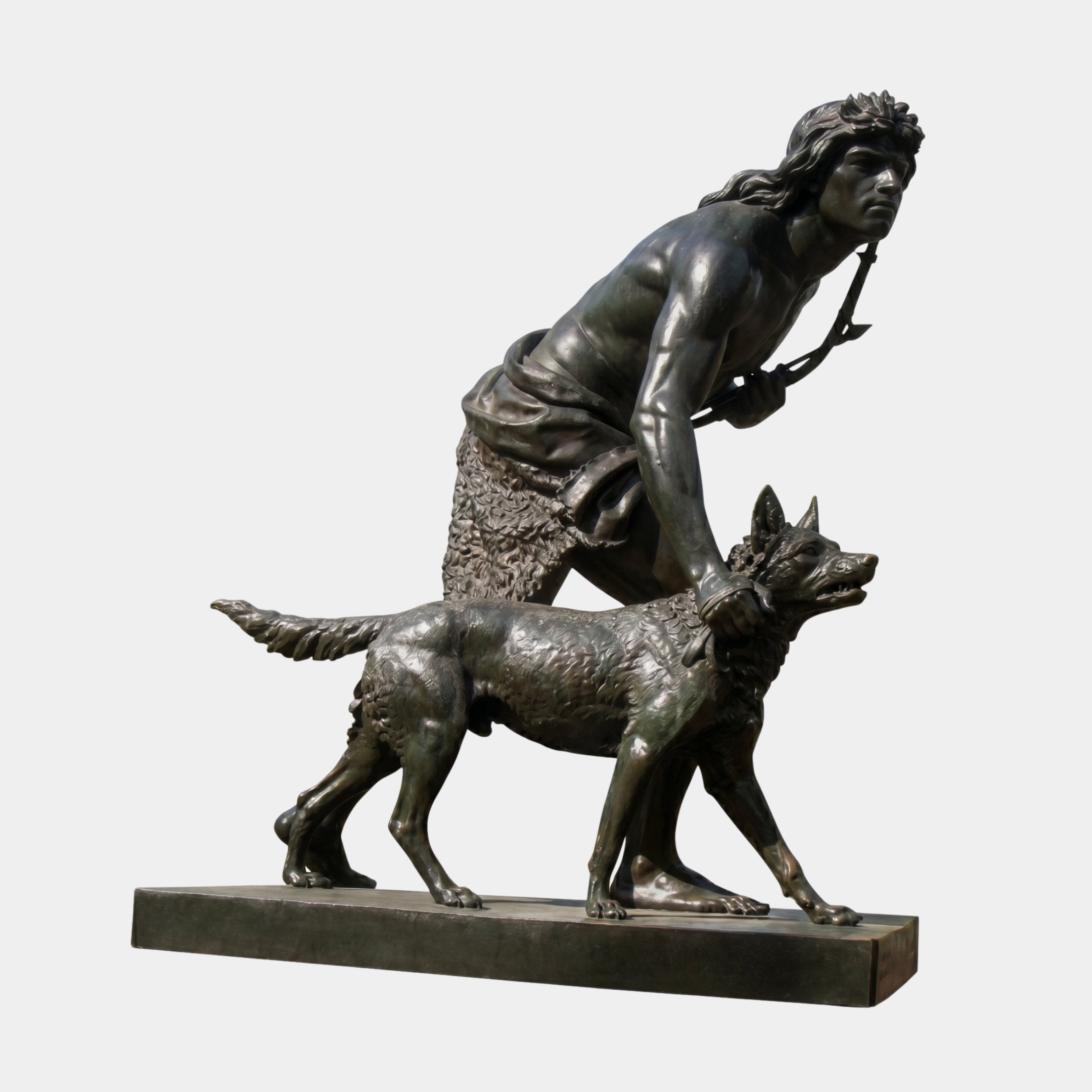 Life-Size Classical Hunter and Wolf Bronze Sculpture by Giant Sculptures, dark patina figure striding beside a wolf on a rectangular base, plain background.