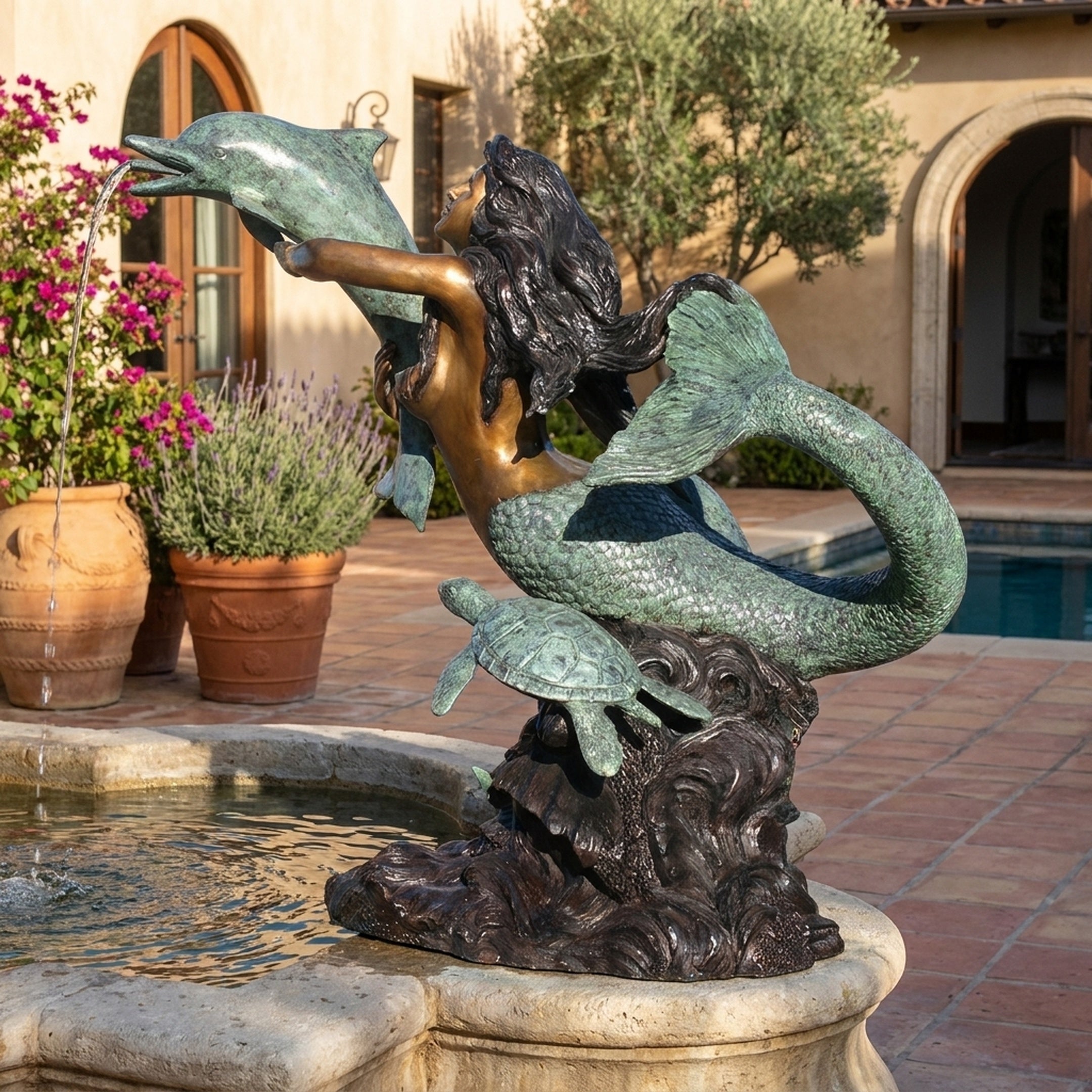 Giant Sculptures Life-Size Classical Mermaid with Dolphin and Sea Turtle Bronze Fountain in verdigris and golden-brown patina, flowing water beside a courtyard pool.