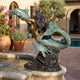 Giant Sculptures Life-Size Classical Mermaid with Dolphin and Sea Turtle Bronze Fountain in verdigris and golden-brown patina, flowing water beside a courtyard pool.
