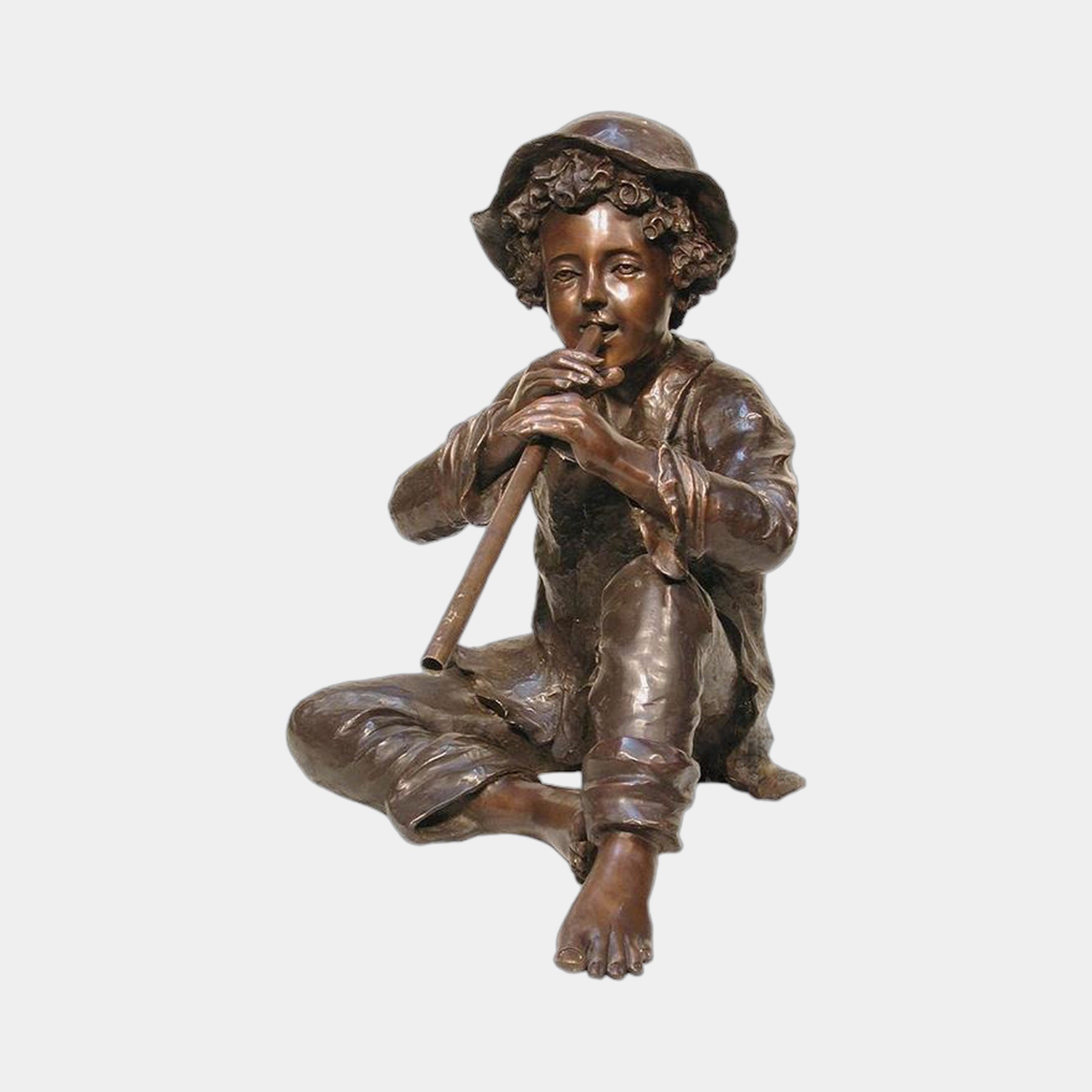 Life-Size Classical Seated Boy Playing Flute Bronze Sculpture by Giant Sculptures, barefoot boy in wide-brimmed hat cross-legged with flute, warm brown patina.