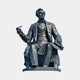 Life-Size Classical Seated Figure Bronze Statue 250cm by Giant Sculptures, bearded man in formal suit on ornate chair holding a quill, dark patina, plain background.