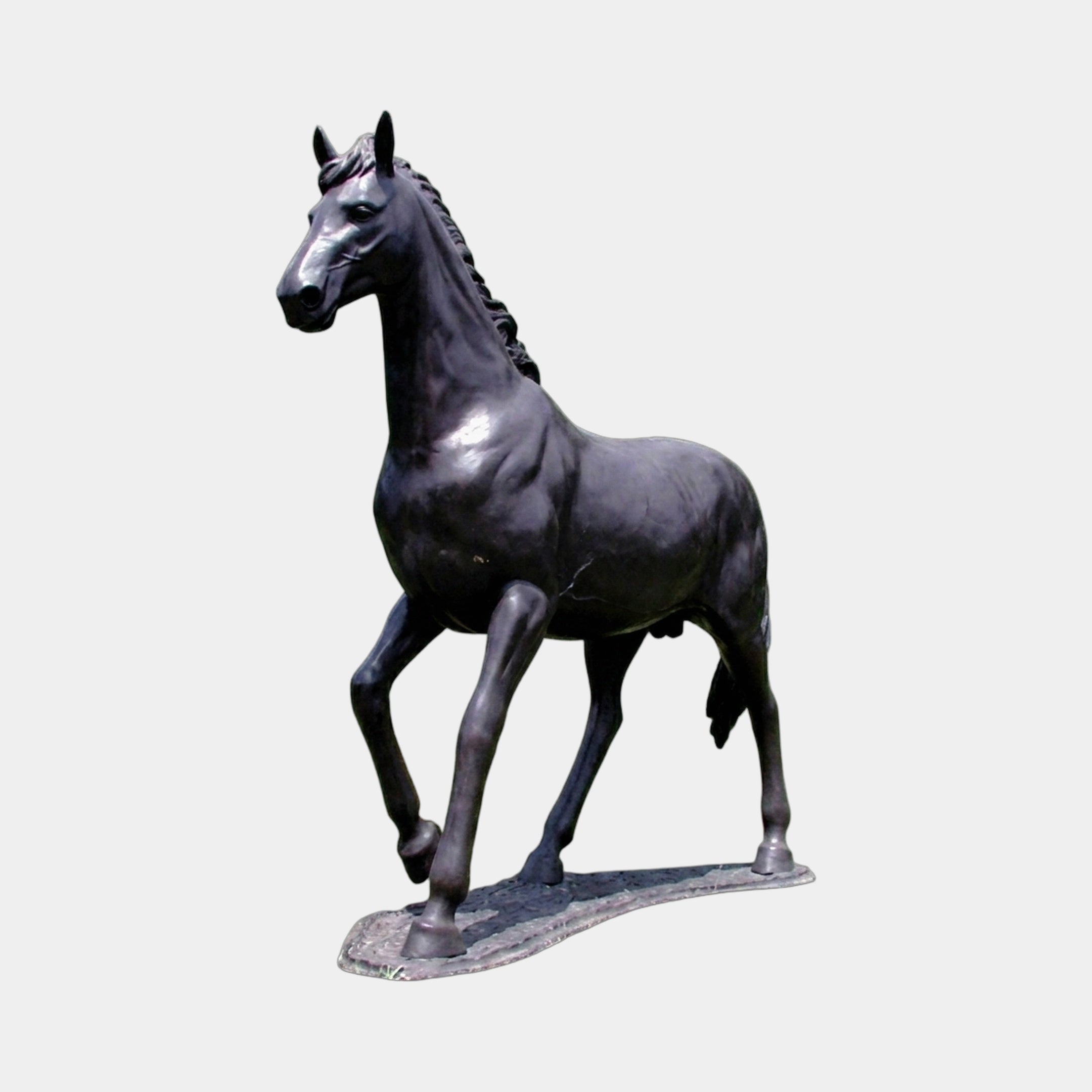 Life-Size Classical Trotting Horse Bronze Sculpture by Giant Sculptures, 180cm, dark patina horse mid-stride with raised foreleg on an oval base, plain background.