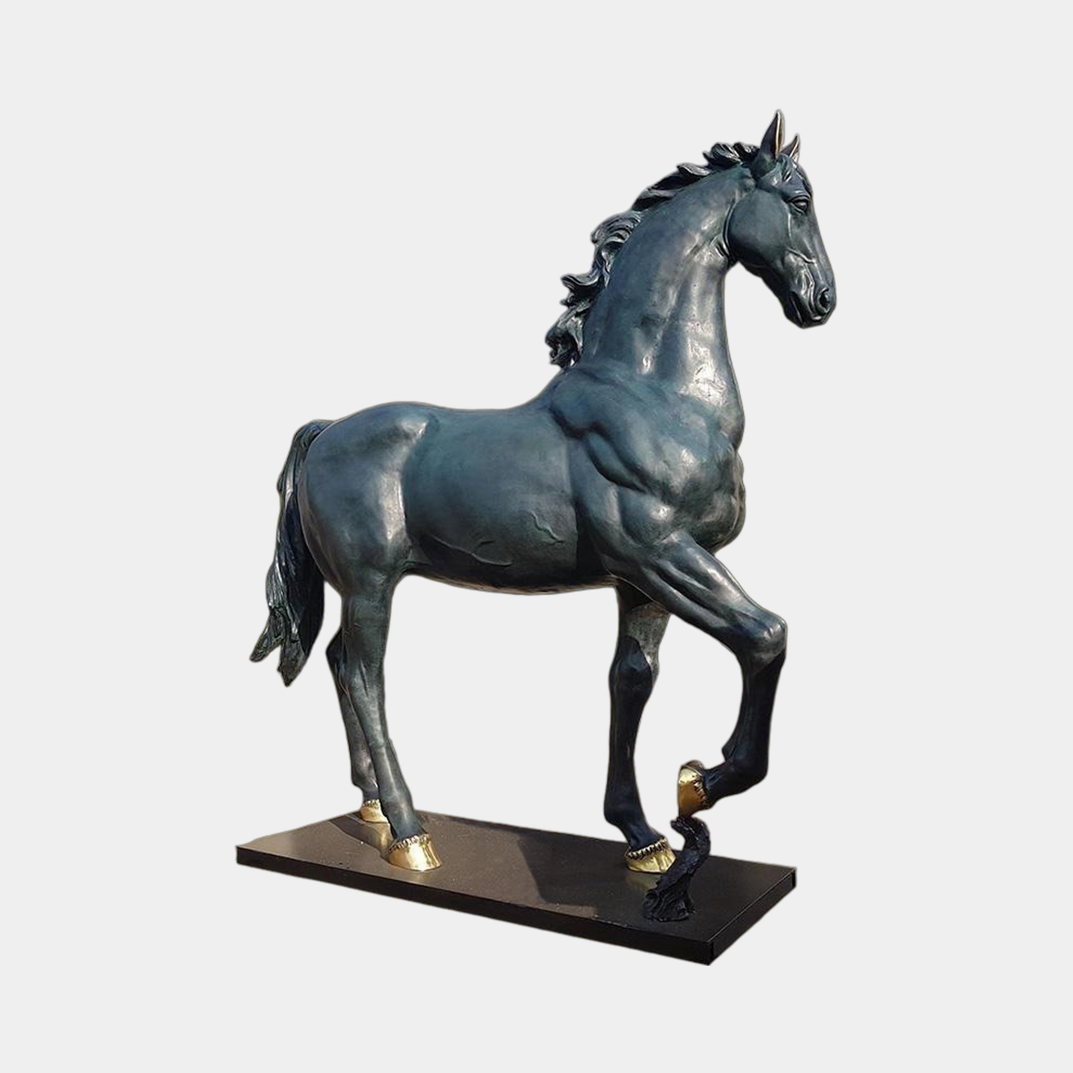 Life-Size Classical Walking Horse Bronze Sculpture by Giant Sculptures, 200cm, shown in side profile with arched neck, raised foreleg, dark blue-black patina and gold hooves on a black rectangular base.