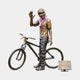 Life-Size Contemporary Bearded Cyclist and Bicycle Bronze Sculpture by Giant Sculptures, waving figure in helmet beside bike with beads, on plain background.