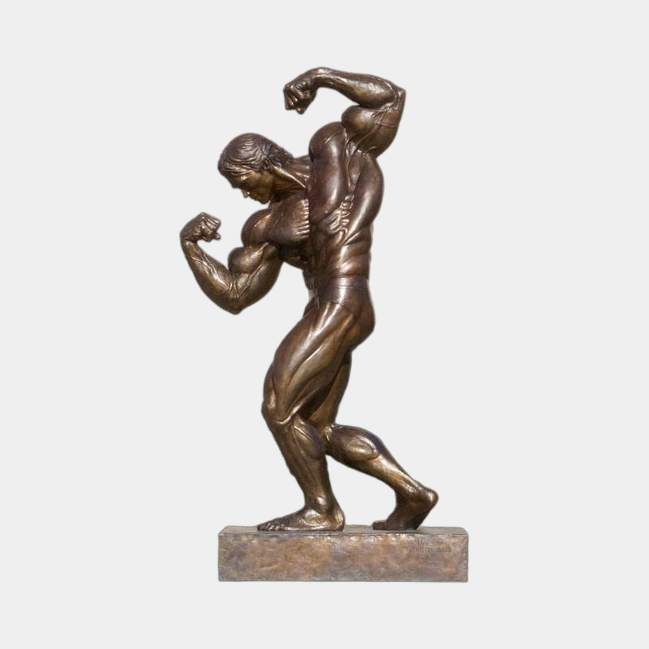 Life-Size Contemporary Bodybuilder Bronze Sculpture by Giant Sculptures shown in side profile, mid-brown patina, peak flex pose on rectangular base, plain background.