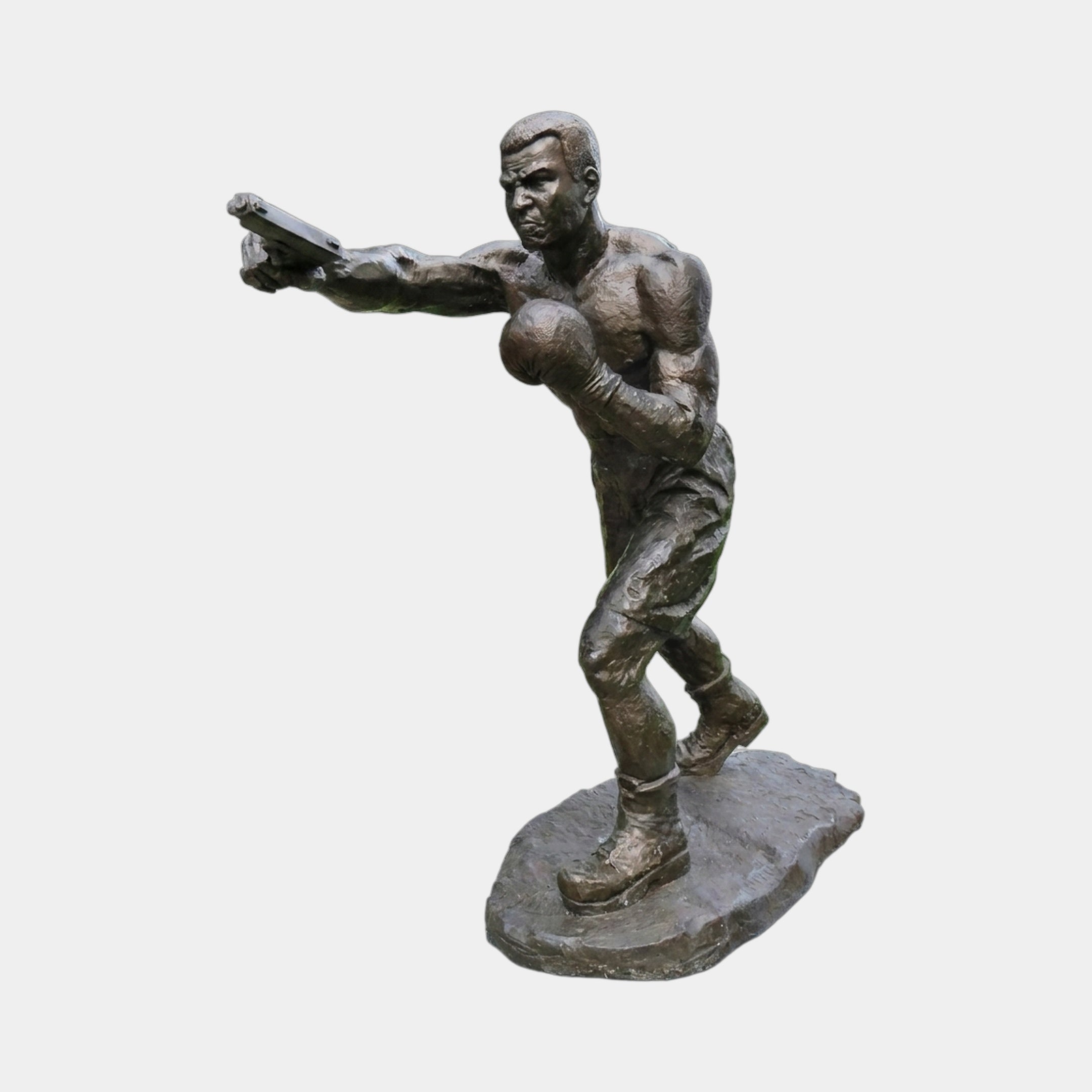 Life-Size Contemporary Boxer Bronze Sculpture 220cm by Giant Sculptures, shirtless figure mid-punch with left arm extended, dark brown patina, oval base.