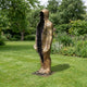 Life-Size Contemporary Emerging Figures Bronze Sculpture by Giant Sculptures, 210cm golden leaf-veined figure with split hollow interior, displayed on a garden lawn.