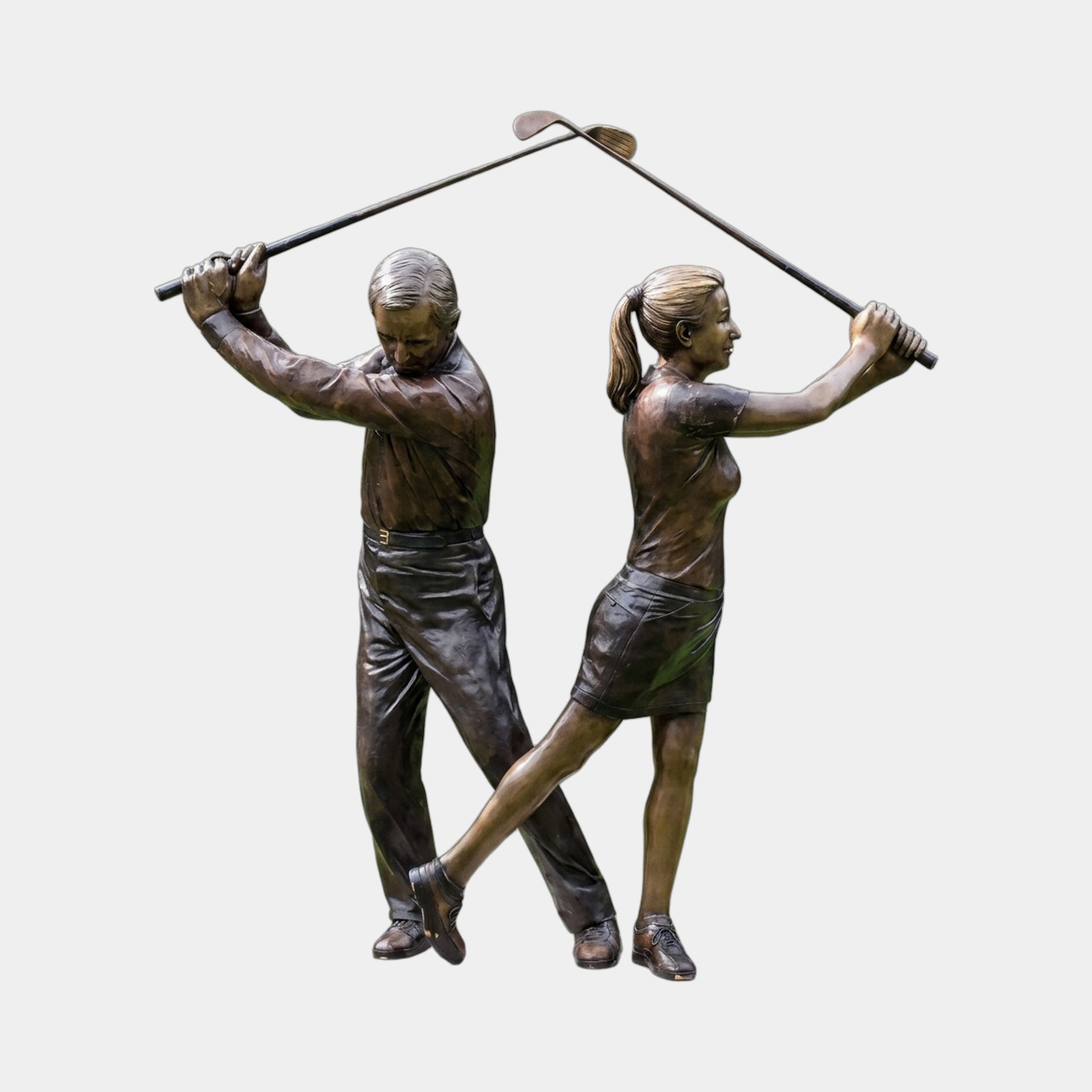 Life-Size Contemporary Golfer Duo Bronze Sculpture by Giant Sculptures, male and female figures back-to-back in mid-swing with clubs arcing overhead.