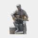 Life-Size Contemporary Guitarist Bronze Sculpture by Giant Sculptures, seated male figure on a bronze tree stump playing acoustic guitar with warm brown patina.