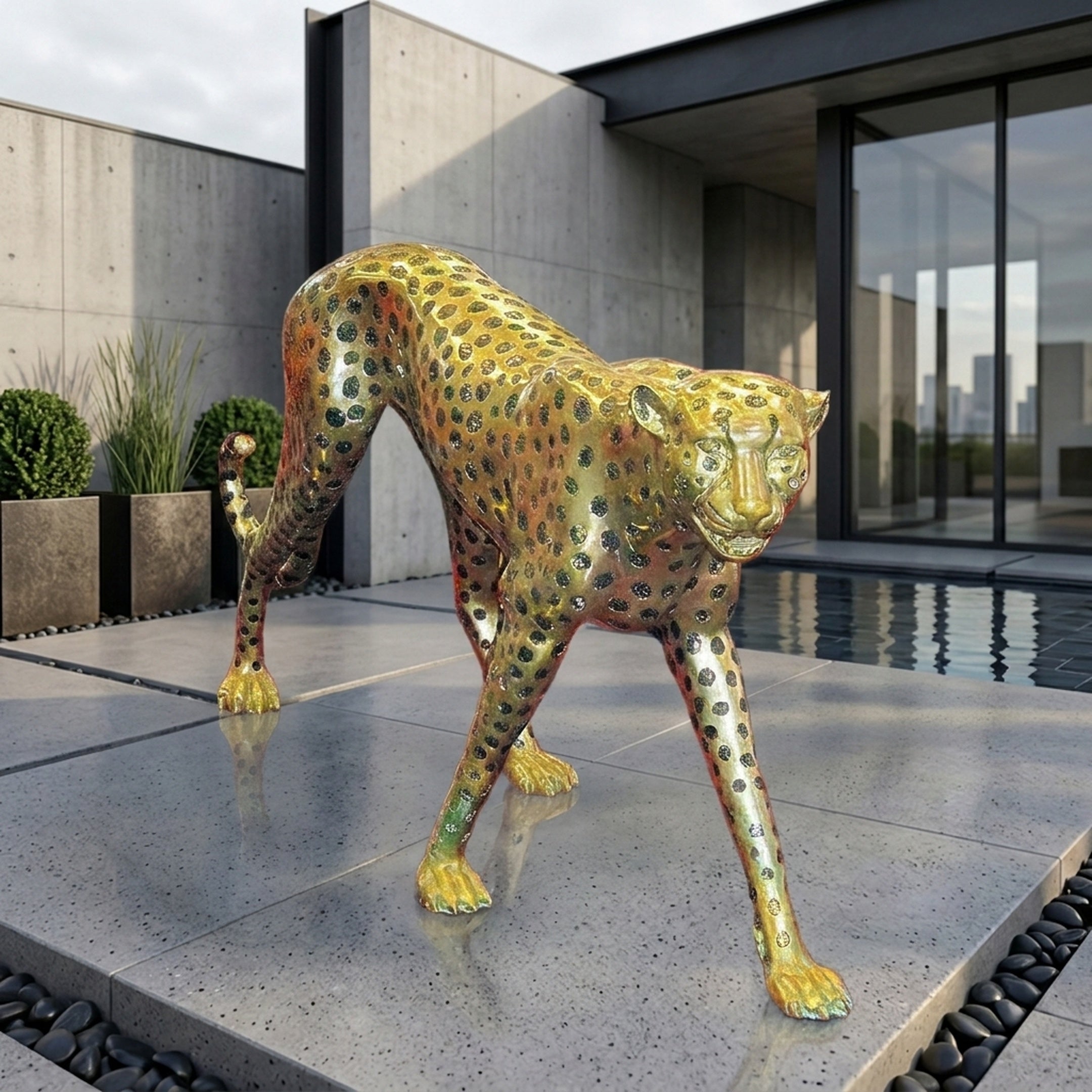 Life-Size Contemporary Leopard Bronze Sculpture by Giant Sculptures in gold with black rosettes, mid-stalk pose on a modern poolside patio.