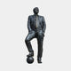 Life-Size Contemporary Male Figure Bronze Sculpture by Giant Sculptures, 290cm dark-patina suited man with one foot resting on a football, on plain background.