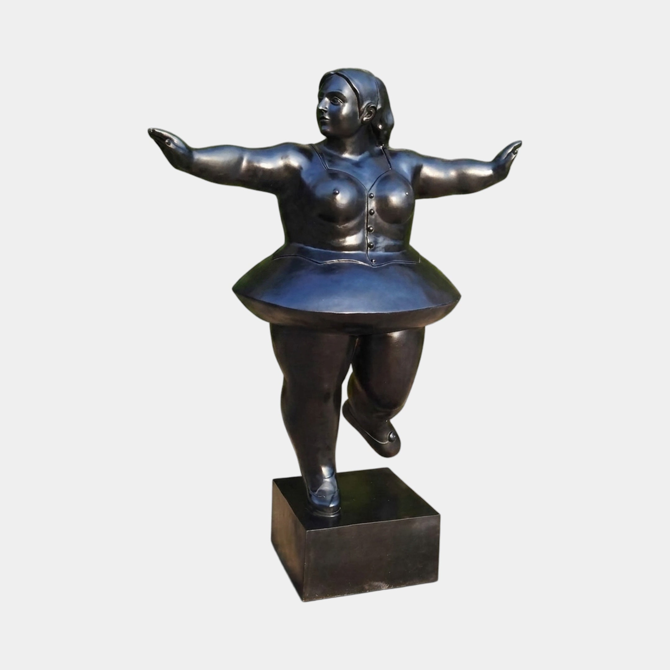 Life-Size Contemporary Rotund Dancer Bronze Sculpture by Giant Sculptures, full-figured ballerina in tutu balancing on one heel with arms outstretched, on a square plinth.