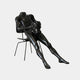 Life-Size Contemporary Seated Male Figure Bronze Sculpture by Giant Sculptures, 150cm matte black nude reclining on a slender metal chair with coral-like growths across torso and head, shown on a plain background.