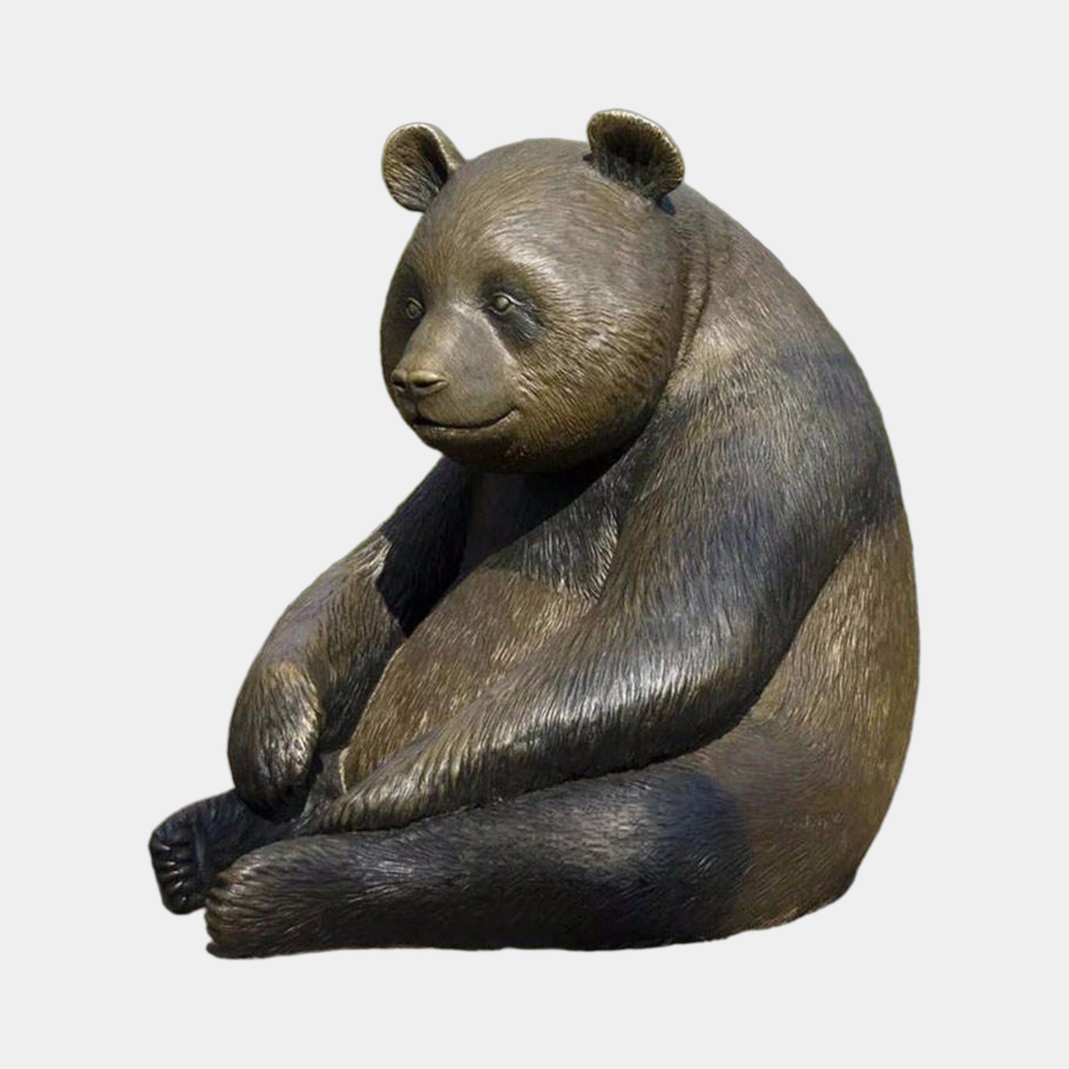 Life-Size Contemporary Seated Panda Bronze Sculpture by Giant Sculptures, shown seated in a brown and black hand-finished patina against a plain grey background.