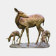 Life-Size Doe and Fawns Bronze Sculpture by Giant Sculptures, showing a standing doe with two spotted grazing fawns on a stone-effect base.
