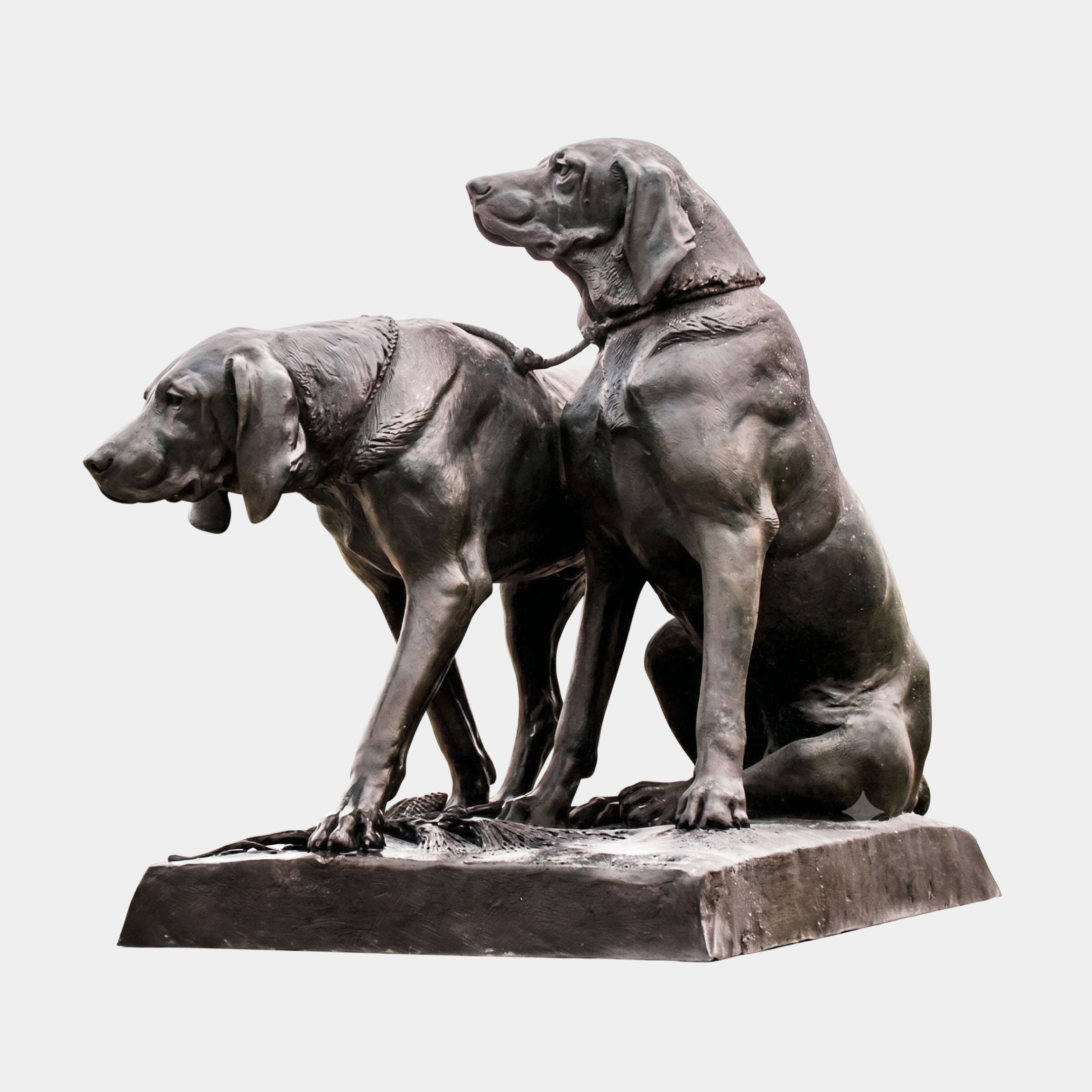 Life-Size Hunting Dogs Bronze Sculpture by Giant Sculptures showing two dark-patinated hounds, one standing alert and one seated, joined by a lead on a plain background.