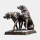 Life-Size Hunting Dogs Bronze Sculpture by Giant Sculptures showing two dark-patinated hounds, one standing alert and one seated, joined by a lead on a plain background.