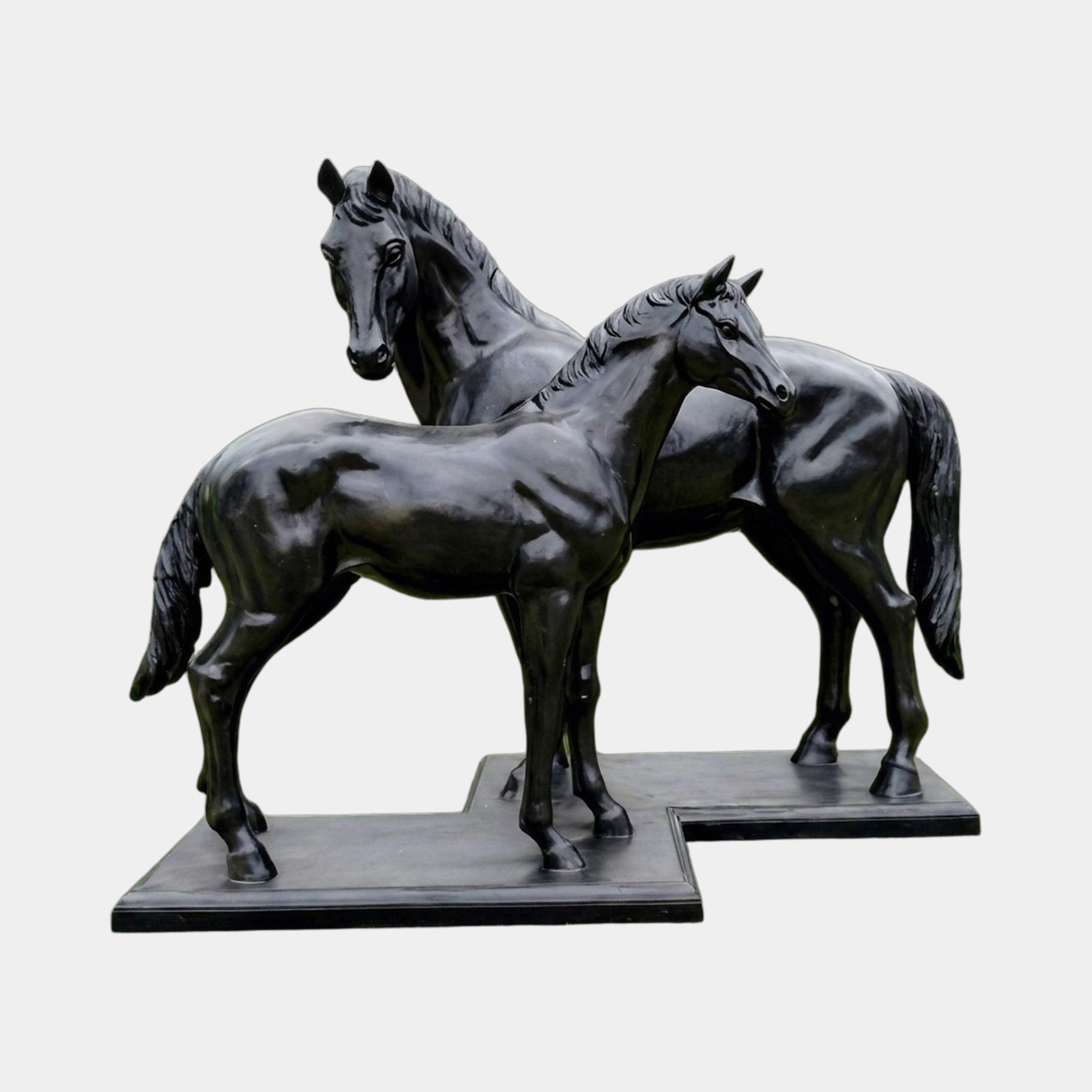 Life-Size Standing Mare and Foal Bronze Sculpture by Giant Sculptures in deep black patina, shown side by side on rectangular plinths against a plain background.