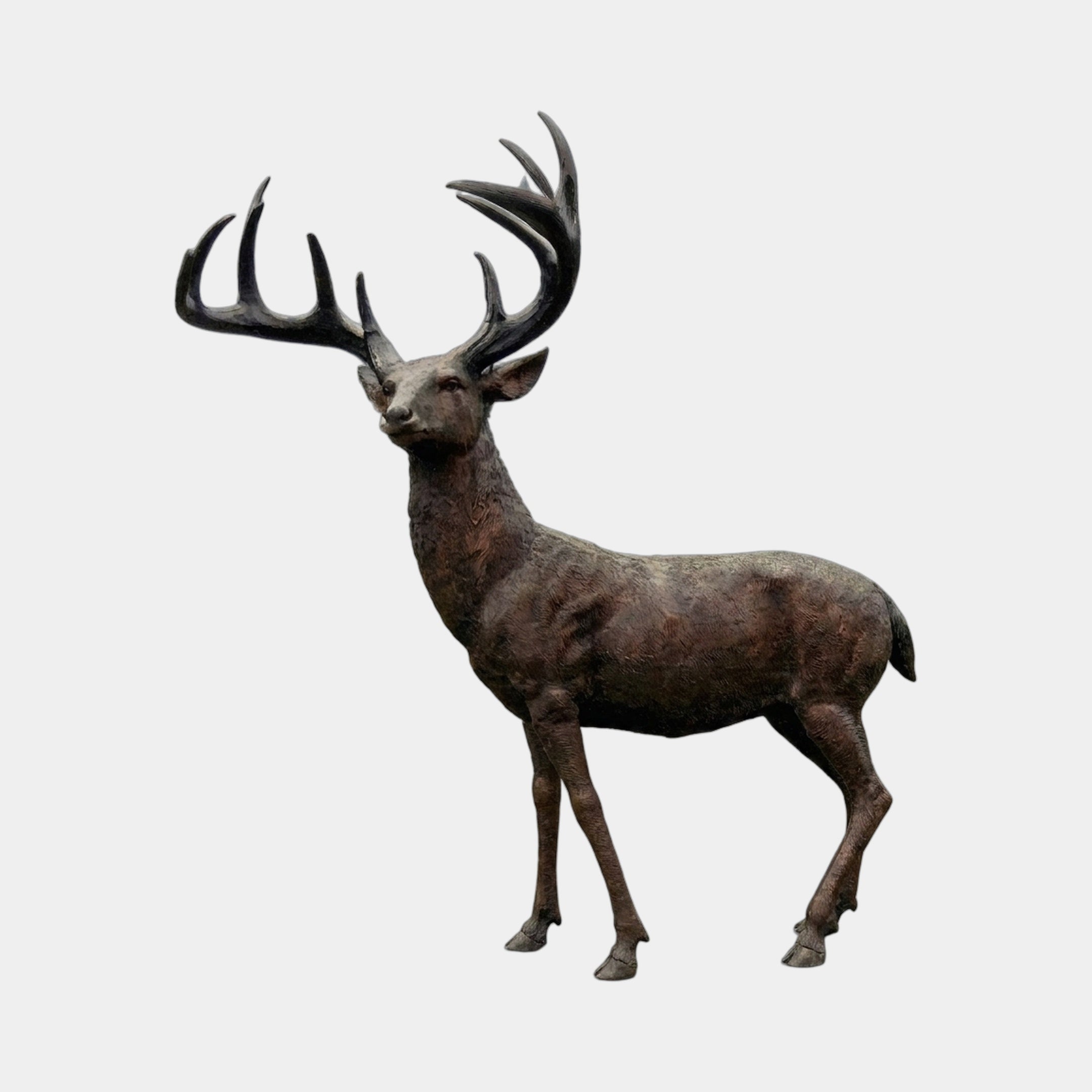 Giant Sculptures Life-Size Standing Stag Bronze Sculpture 270cm shown in side profile with raised head and wide multi-point antlers, dark brown patina, plain background.