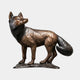 Life-Size Traditional Alert Fox Bronze Sculpture by Giant Sculptures shown in side profile with raised head, two-tone golden-brown and black patina, on a flat bronze base.