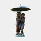 Life-Size Traditional Boy and Girl Bronze Sculpture by Giant Sculptures, 190cm, two children in period clothing sheltering beneath an open umbrella.