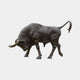 Giant Sculptures Life-Size Traditional Charging Bull Bronze Sculpture 220cm, head lowered with horns forward and tail arched, dark patina, plain background.
