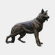 Life-Size Traditional German Shepherd Bronze Sculpture by Giant Sculptures, side view mid-stride with raised paw, dark brown patina and chain collar.