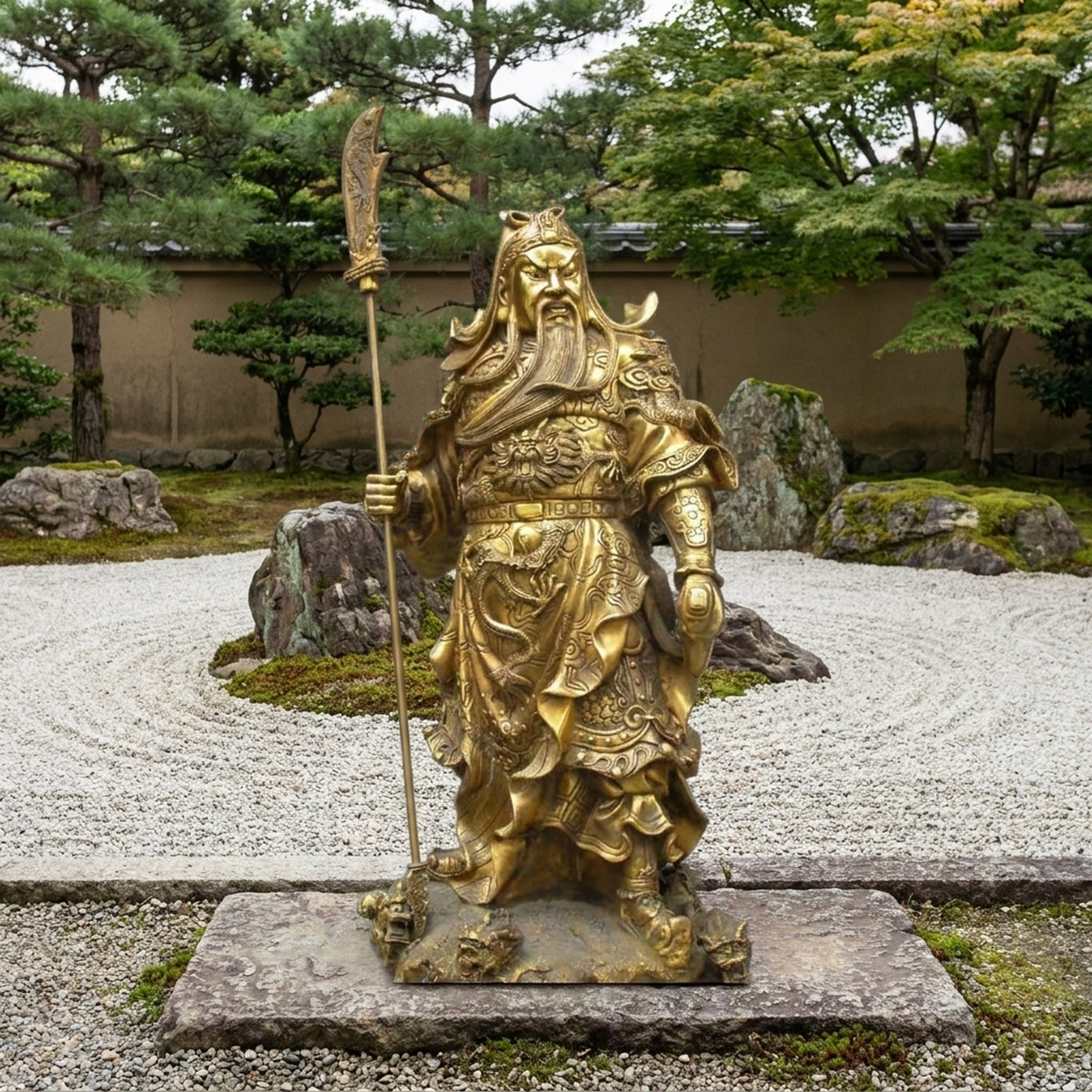 Life-Size Traditional Guan Yu Warrior Bronze Statue 220cm by Giant Sculptures in gold finish, holding the Green Dragon Crescent Blade in a Zen rock garden.