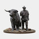 Giant Sculptures Life-Size Traditional Highland Bull and Drover Bronze Sculpture Group, 240cm, with dark patinated bull, staff-holding figure, and rock base.