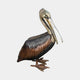 Life-Size Traditional Pelican Bronze Sculpture by Giant Sculptures shown in side view with folded wings, long beak, dark brown body and golden head on plain background.