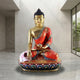Life-Size Traditional Seated Tibetan Buddha Bronze Sculpture by Giant Sculptures in gilt gold with red polychrome robes on a lotus throne in a stone interior.
