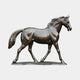 Life-Size Traditional Trotting Horse Bronze Sculpture by Giant Sculptures, 190cm, shown in side profile with raised foreleg and warm brown polished patina.