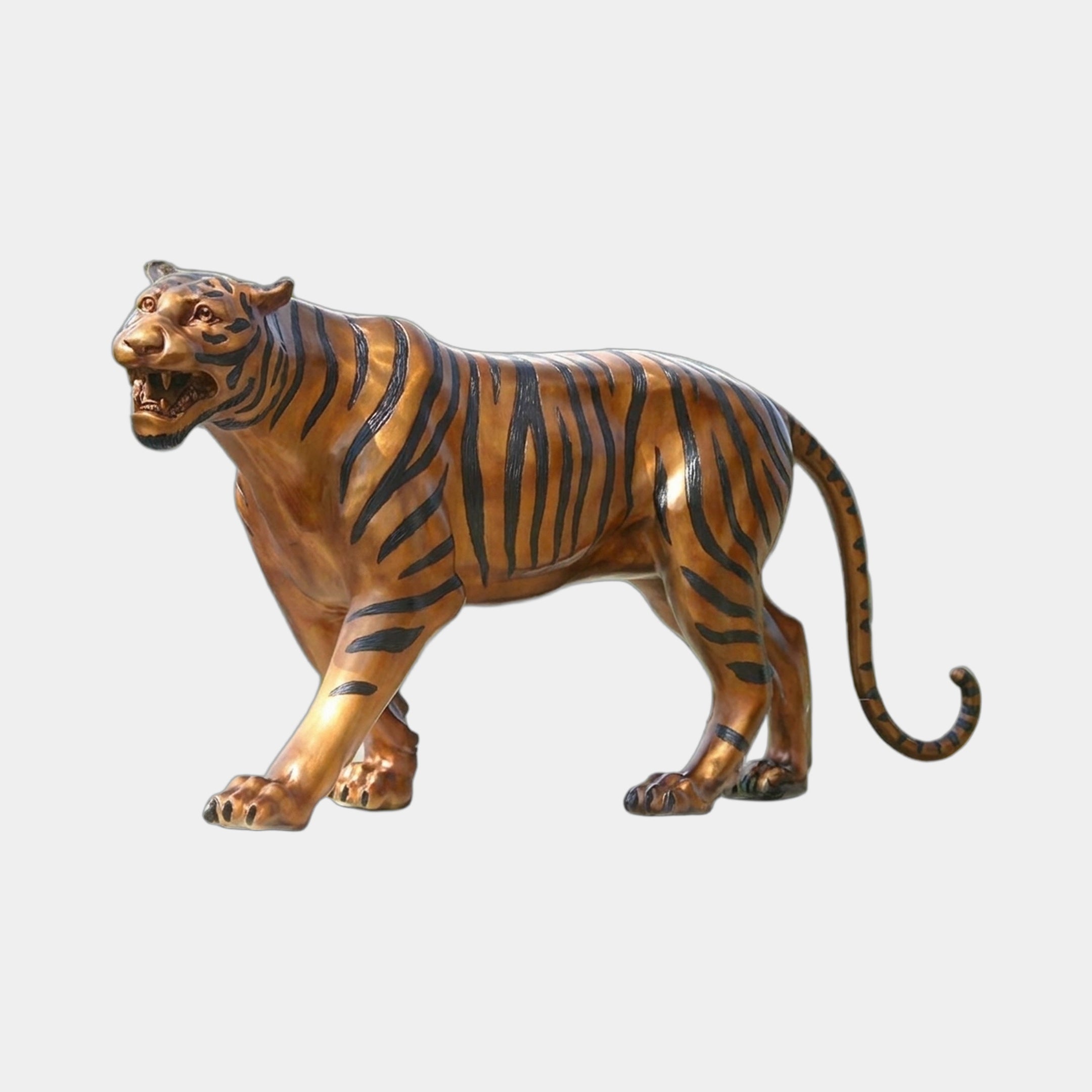Life-Size Traditional Walking Bengal Tiger Bronze Sculpture by Giant Sculptures in amber and black polychrome finish, shown mid-stride snarling, side view on white.