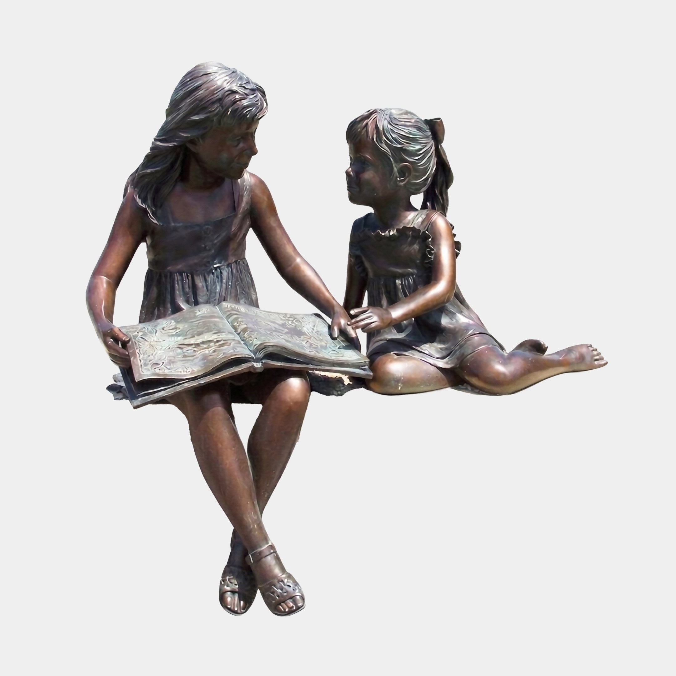 Giant Sculptures Life-Size Two Girls Reading on a Bench Bronze Sculpture, 130cm, warm brown patina, older girl holding an open book beside a younger seated girl.