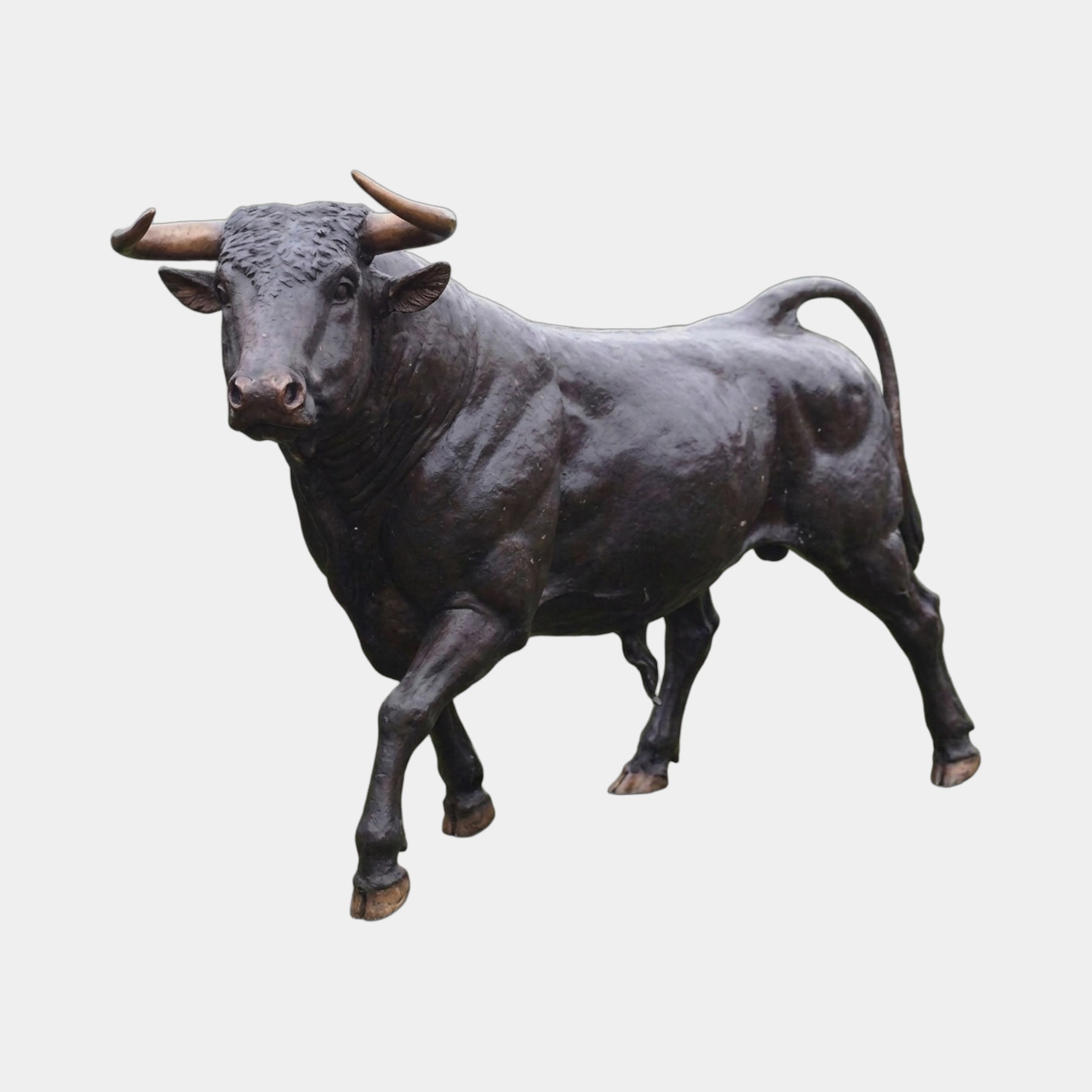 Life-Size Walking Longhorn Bull Bronze Sculpture by Giant Sculptures, 200cm, dark patina with golden-brown horns, mid-stride pose, shown on a plain background.
