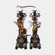 Pair of Giant Sculptures Monumental Classical Cherub Candelabra Torchiere Bronze Sculptures with verdigris butterfly wings, five globe lights, on relief plinths.