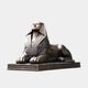 Monumental Classical Egyptian Sphinx Bronze Sculpture 200cm by Giant Sculptures, recumbent lion body with nemes headdress, dark patina on plinth, grey background.