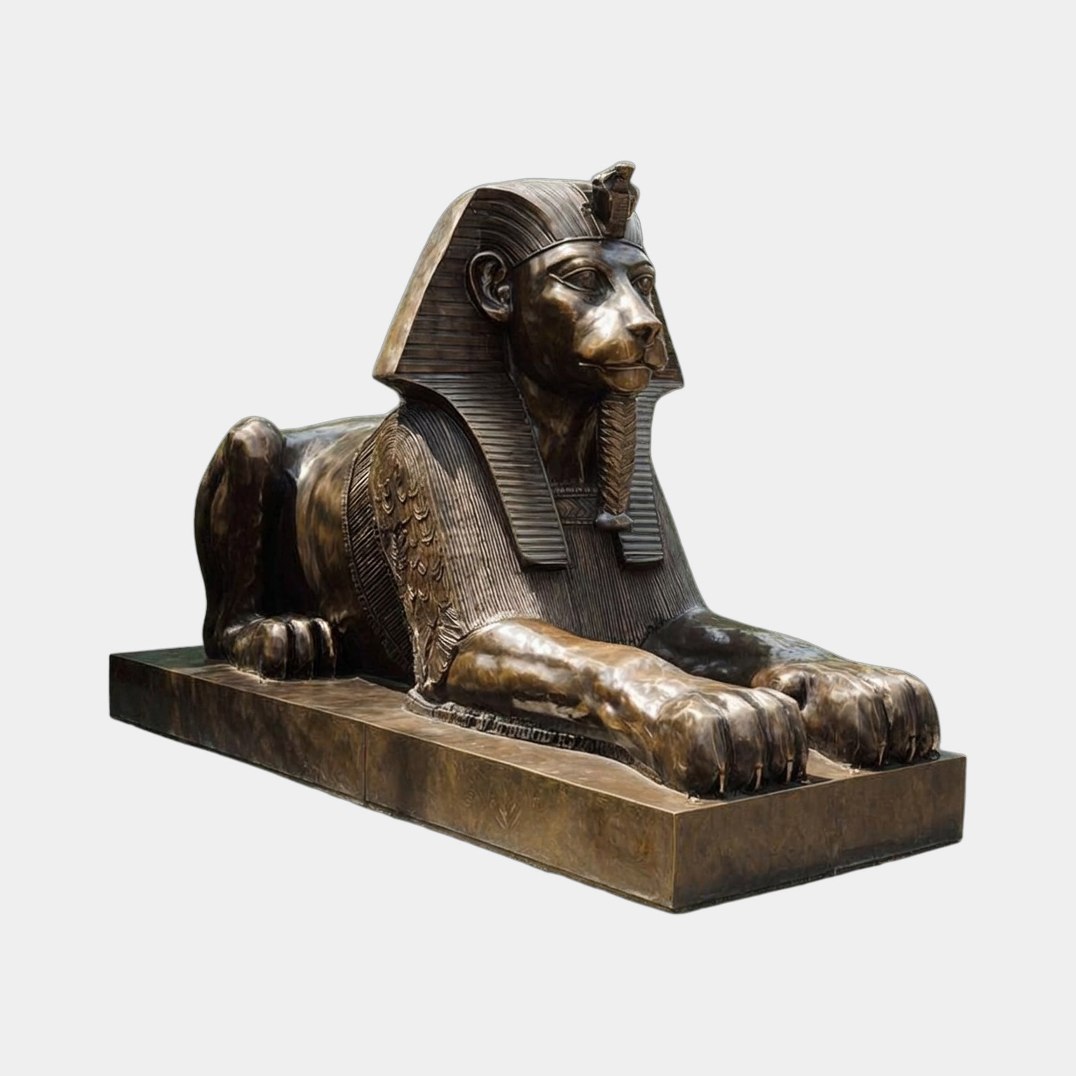Monumental Classical Egyptian Sphinx Bronze Sculpture by Giant Sculptures, 370cm recumbent figure with nemes headdress and folded wings on integral plinth.