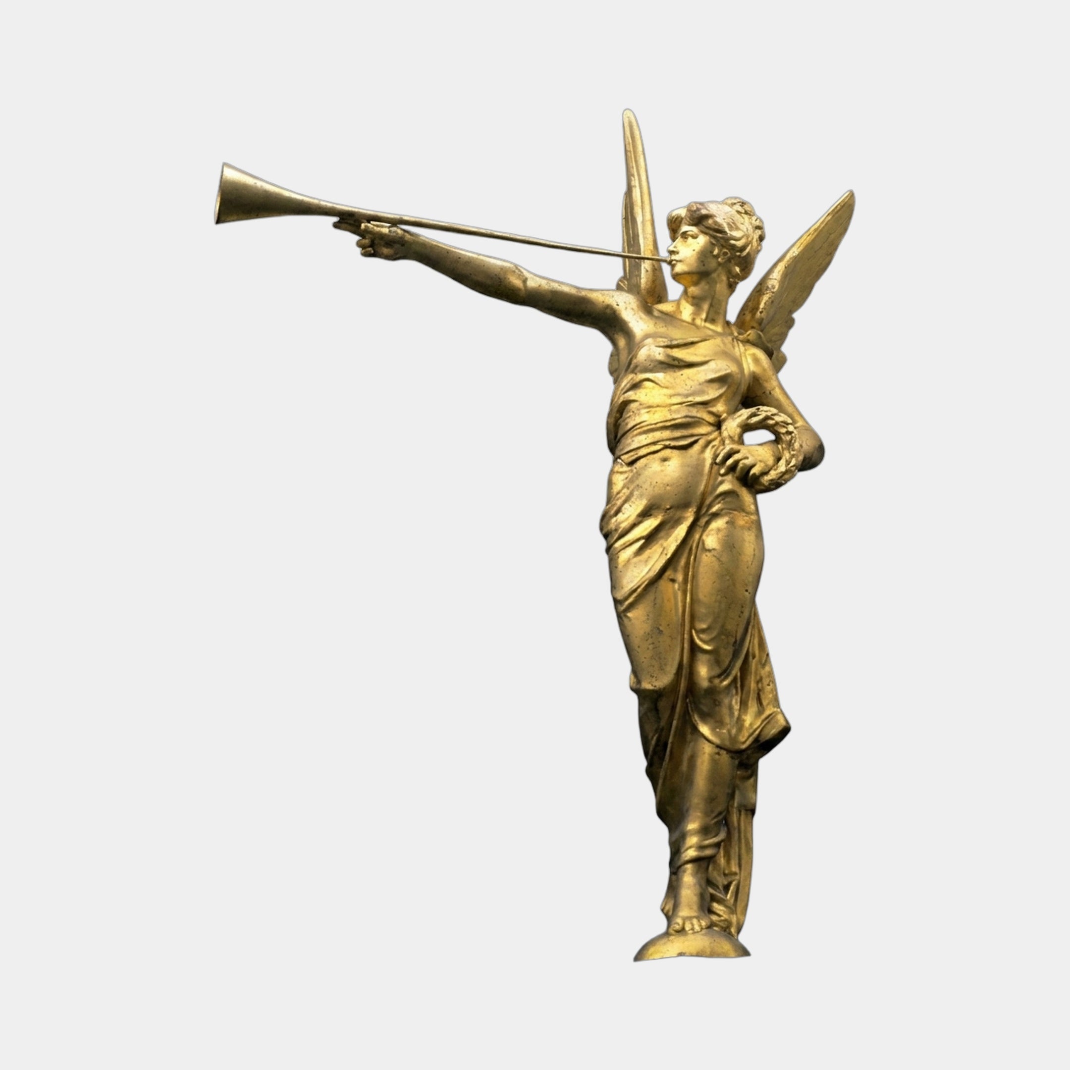 Giant Sculptures Monumental Classical Herald Angel Bronze Sculpture in gilt finish, winged figure raising a trumpet and holding a laurel wreath, side view on plain background.