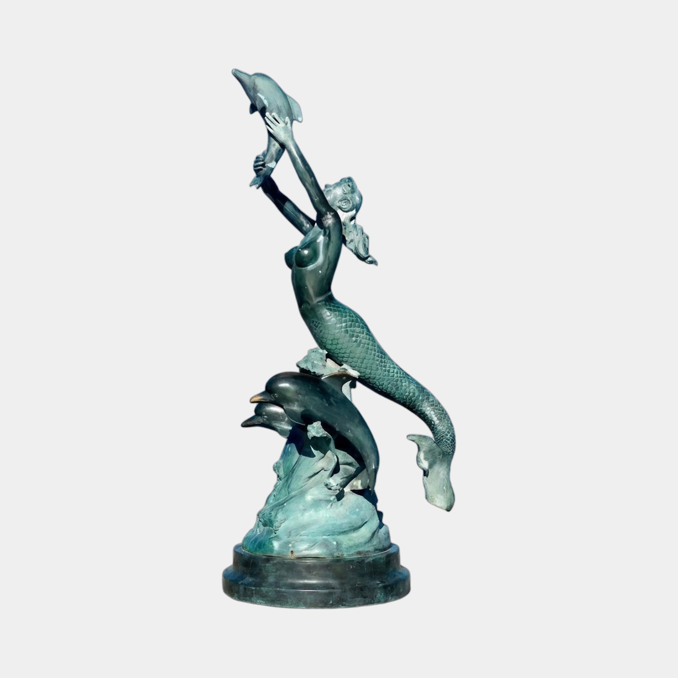 Monumental Classical Mermaid with Dolphins Bronze Fountain by Giant Sculptures in verdigris patina, mermaid raising a dolphin overhead above two leaping dolphins.